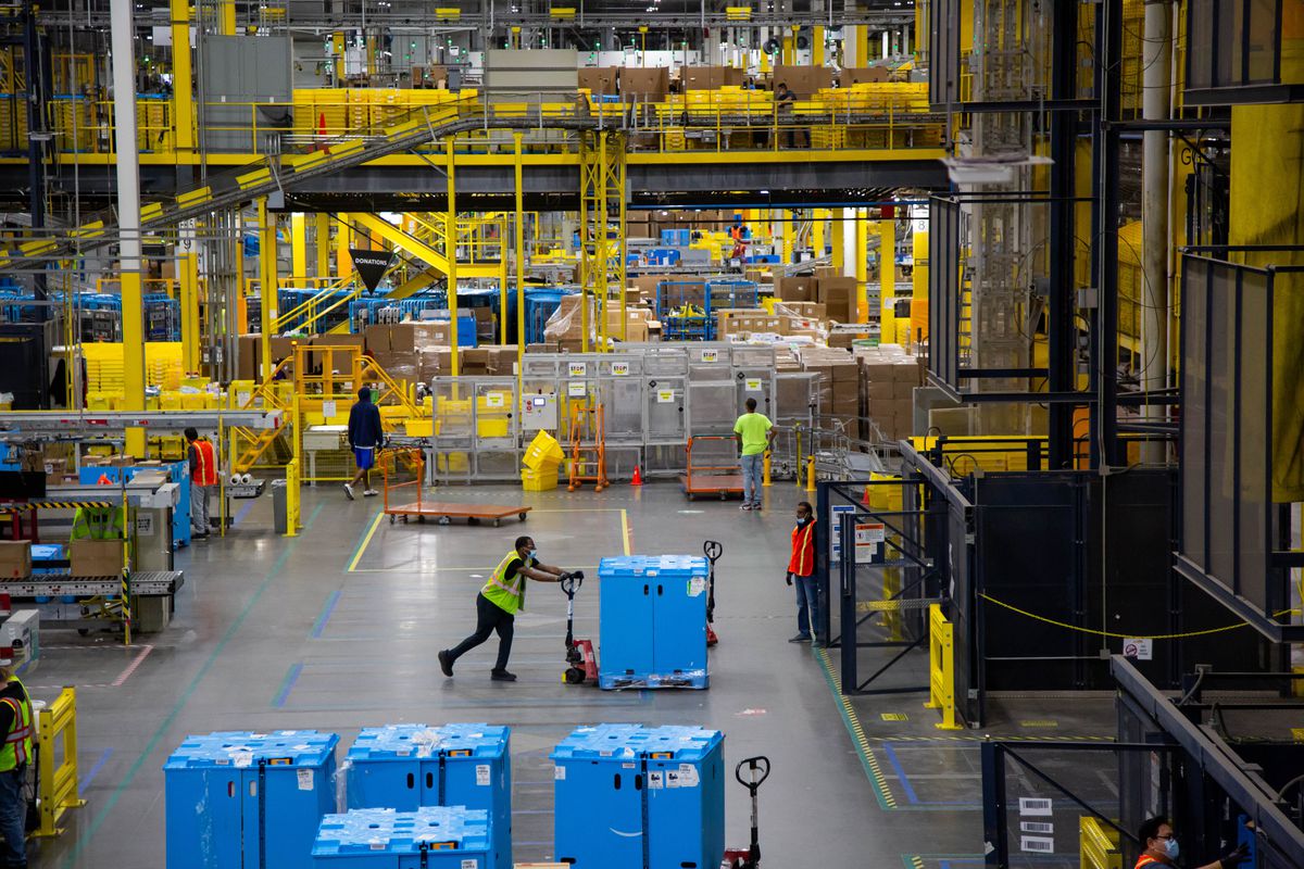 Workers at an Amazon fulfillment center on Cyber Monday 2021